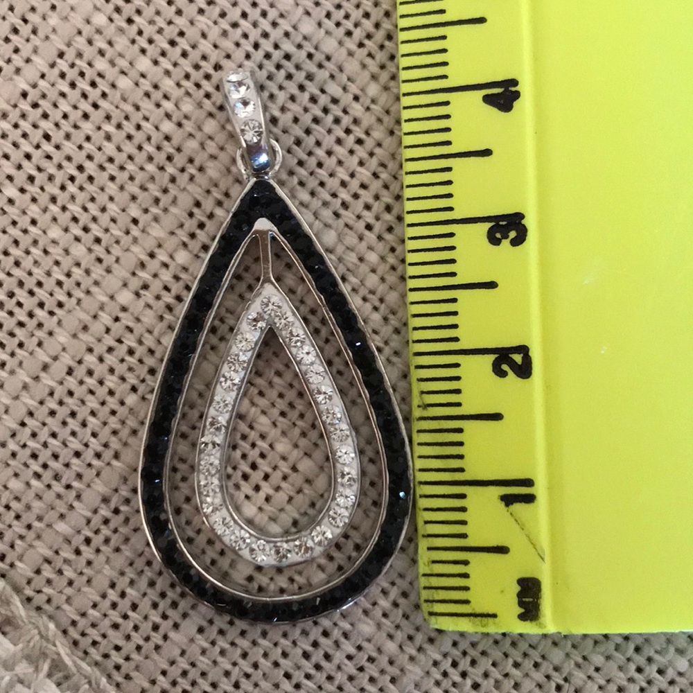 Black and silver zirconium pendant